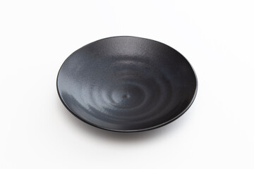 白背景に黒い皿
