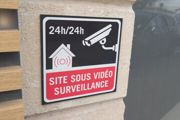 site sous video surveillance french text means CCTV site under video surveillance in operation 24...