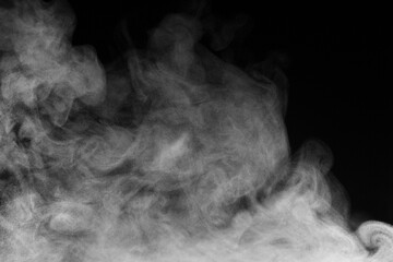 Blur white water vapour on isolated black background. Abstract of steam with copy space.  Smoke on black background. Steam flow. - obrazy, fototapety, plakaty