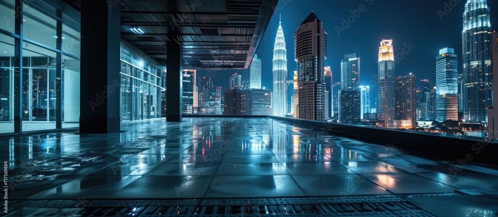 Poster Night view of Kuala Lumpur city with empty floor. Copy space image. Place for adding text or design
