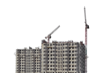 Under construction building against the sky and tower cranes, isolated on a white background. Unfinished construction house