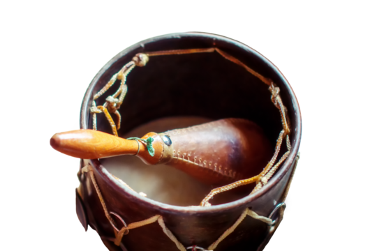 The composition of musical instruments-maracas, Ocarina, tambourine and ethnic drum, isolated on a white background. Percussion and wind instruments are on the table. - Powered by Adobe