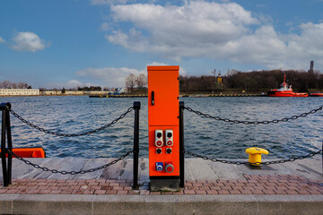 Port of Gdansk, Poland, a fragment of the quay on which there is a cabinet with electricity to service moored ships