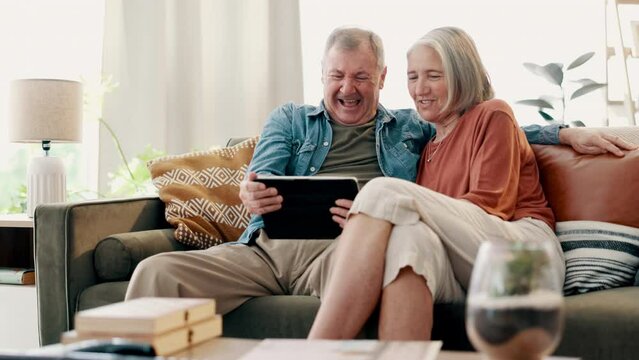 Senior couple, tablet and laughing at home, social media app and streaming comedy in retirement. Happy elderly people, technology and website or blog for online comic, bonding and love for humor