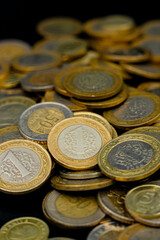 stacked many coins Turkish lira with 1 Lira on foreground