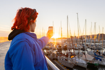 Red Haired Woman at Sunset, Phone Calling, Video Calling, Taking Photos