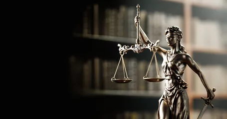 Fotobehang Legal Concept: Themis is the goddess of justice as a symbol of law and order on the background of books © Sikov