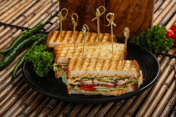Club sandwich with chicken cheese and salad