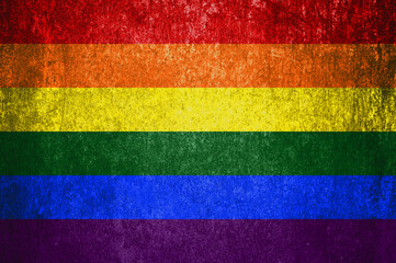 Close-up of the grunge LGBT  flag. Dirty LGBT  flag on a metal surface.