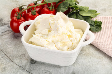 Soft cream cheese in the bowl