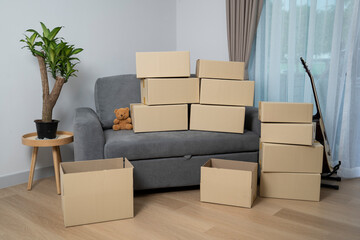 A room full of cardboard boxes stacked during the relocation process.