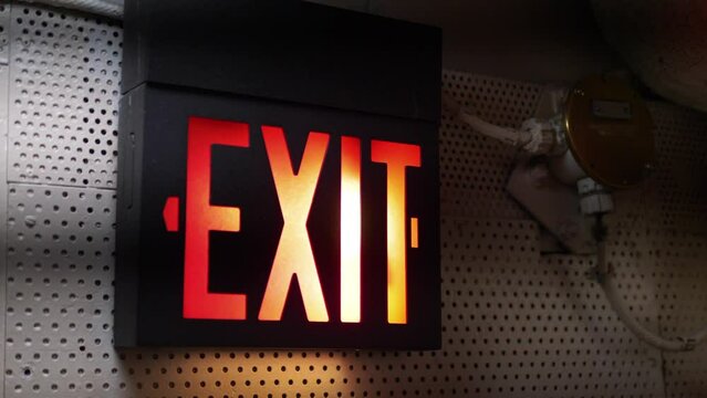 Exit emergency sign in 4K slow motion 60fps