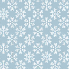 Winter seamless pattern with white snowflakes on blue background. Vector illustration for fabric, textile wallpaper, posters, gift wrapping paper. Christmas vector illustration