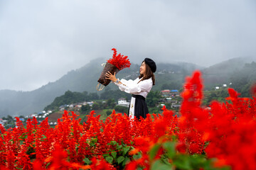 person with a bouquet of flowers