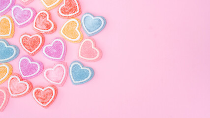Colorfully heart jelly on a pink background. - 717657058