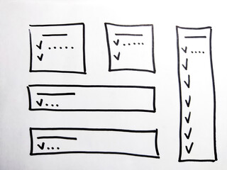 Notepad page with columns marked with a marker, highlighted lines for reading and ticks for list....