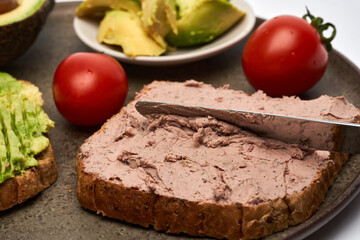 Foie gras pate and avocado on toast