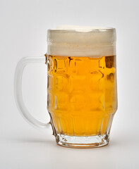 Beer in a mug on white
