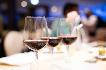 Wine glasses on the luxury dining table in the hotel