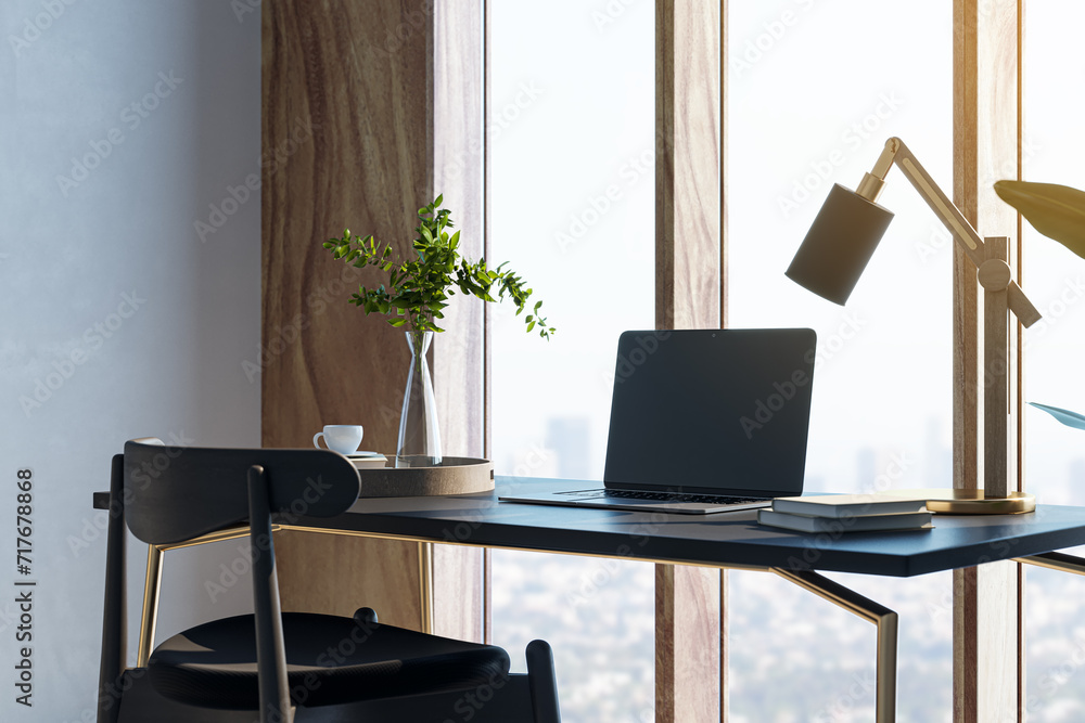 Aufkleber Contemporary designer desktop with mock up laptop, various objects and window with city view in the background. 3D Rendering.