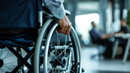 close-up of a person in a wheelchair in an office environment - obrazy, fototapety, plakaty