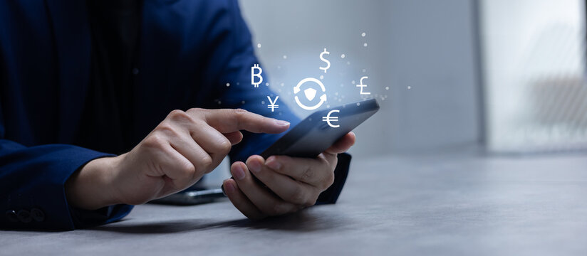 close up investor man hand holding smartphone and trade global currency exchange market by use money transfer application transaction on web for financial and technology with modern lifestyle concept