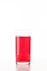 Business lunch. Berry juice in a glass on a white background
