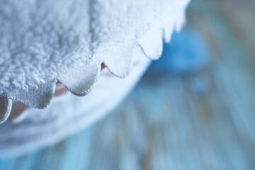 Close-up of shark teeth children's toy on blue wooden background. Free space for copying. Concept -...