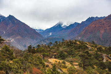 Fototapeta na wymiar View of the Himalayan mountains between Namche Bazar and Kumjung villages. Nepal