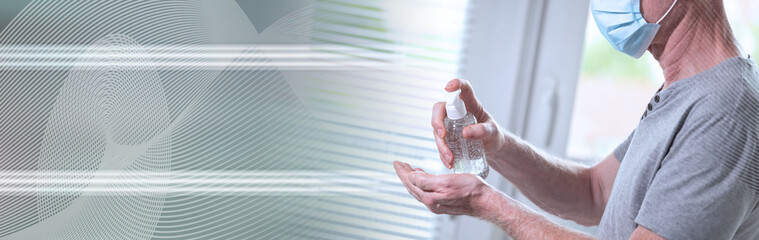 Man using hand sanitizer; prevention of virus and bacteria infection; panoramic banner