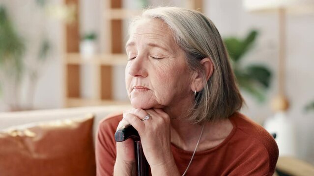 Elderly woman, walking stick and thinking grief in old age or retirement lonely for loss, depression or mental health. Person with a disability, mobility aid and thoughts for sad, regret or worry