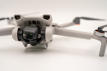 four-winged drone in front of a white background