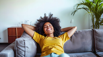 Happy afro american woman relaxing on the sofa at home - Smiling girl enjoying day off lying on the couch - Healthy life style, good vibes people and new home concept - obrazy, fototapety, plakaty