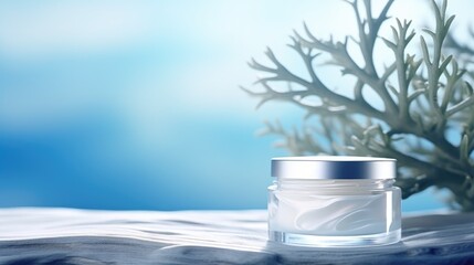 Concept of cosmetic with seaweed ingredient. Organic cosmetic with natural extracts marine algae. Jar of cream skin care and seaweed on blue marine background. Space for text