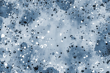 Abstract watercolor, monochrome background. There are dark and light watercolor spots and splashes on a gray-blue background. Illustration.