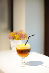 Bumble coffee made of Americano and orange juice