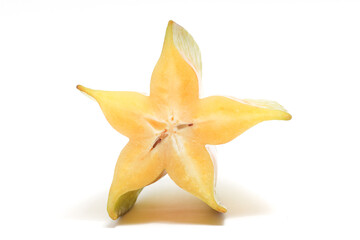 Fototapeta premium Half cut fresh organic star fruit delicious front view isolated on white background clipping path
