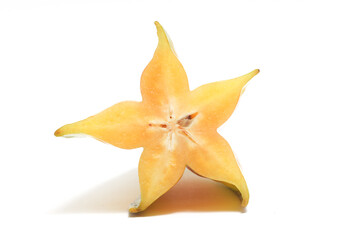 Fototapeta premium Half cut fresh organic star fruit delicious front view isolated on white background clipping path