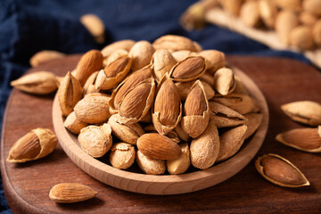 Closeup of almonds，organic badam on table.