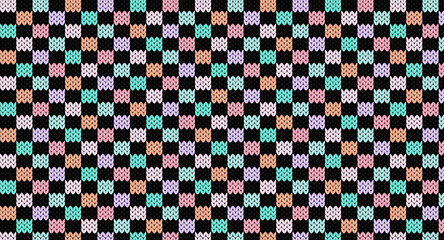 Fototapeta premium Pastel squares on black knitted pattern, Festive Sweater Design. Seamless Knitted Pattern