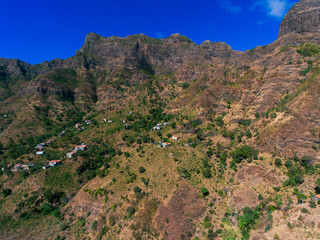 Barragem Principal in Santiago Island, Cape Verde, water dam view from the top of the mountain, view of the sea, mountains and small village.