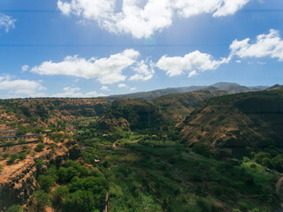 Fototapeta premium Barragem Principal in Santiago Island, Cape Verde, water dam view from the top of the mountain, view of the sea, mountains and small village.