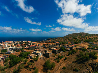 Barragem Principal in Santiago Island, Cape Verde, water dam view from the top of the mountain, view of the sea, mountains and small village.