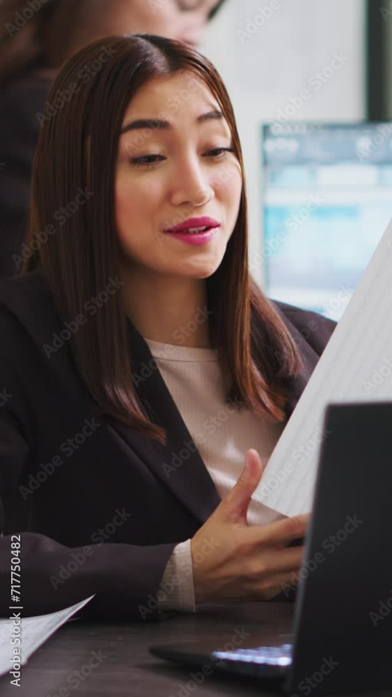 Poster vertical video building engineer on videocall with technician to ensure suitable design elements, wo