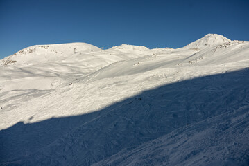 Snowy alps mountains in Europe.. French alps in winter, Les deux alpes Rhone Alpes in France Europe