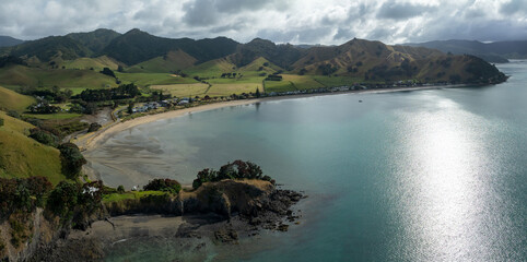 Beach and headland of Otautu bay, Coromandel, Coromandel Peninsula, New Zealand.