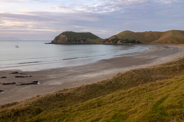 Calm ocean beack of Port Jackson, Coromandel Peninsula, New Zealand.