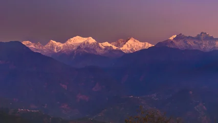 Foto auf Acrylglas Kangchendzönga A view of Snow clad Kangchenjunga, also spelled Kanchenjunga,the third highest mountain in the world, at the time of Sunrise.