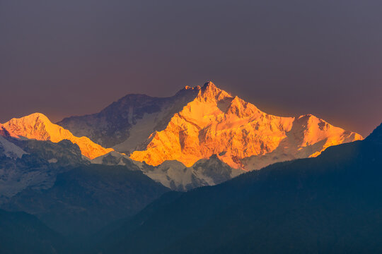 Sunrise view of Snow clad Kangchenjunga, also spelled Kanchenjunga, is the third highest mountain in the world.
