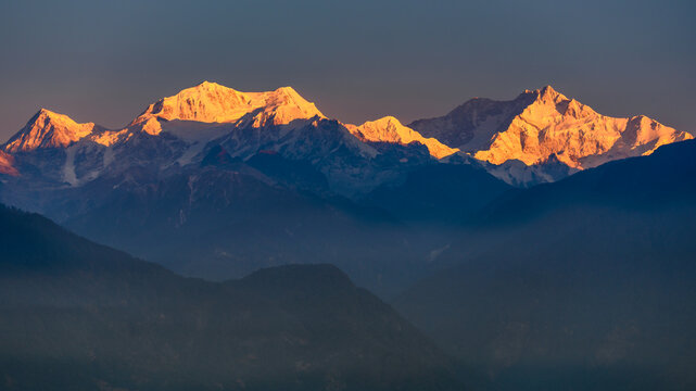 A view of Snow clad Kangchenjunga, also spelled Kanchenjunga, is the third highest mountain in the world. It lies between Nepal and Sikkim, India,